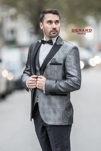 Monte Carlo Glamour Wedding Suit in metallic silver with black satin lapels, featuring a matching vest and black bow tie