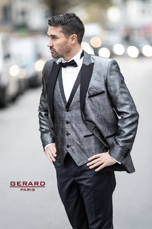 Monte Carlo Glamour Wedding Suit in metallic silver with black satin lapels, featuring a matching vest and black bow tie