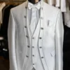 Monaco White Regal wedding suit with standard-length jacket, silver buttons, matching vest, and bow tie