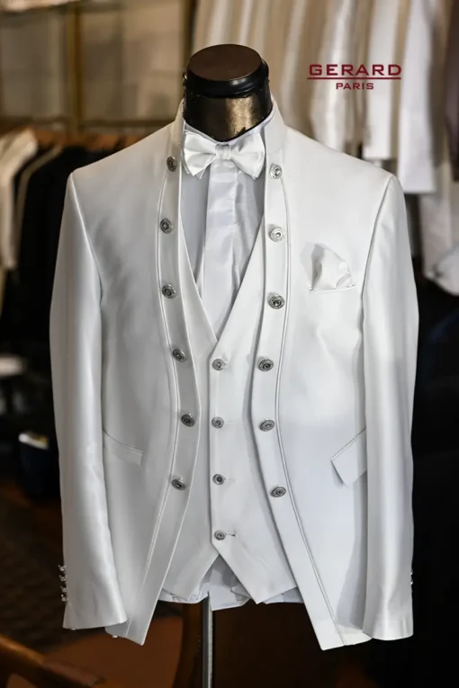 Monaco White Regal wedding suit with standard-length jacket, silver buttons, matching vest, and bow tie